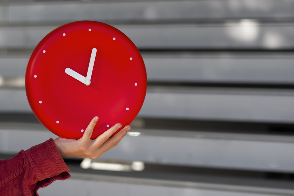 hand-holding-wall-clock-still-life.jpg hand-holding-wall-clock-still-life.jpg
